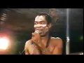 Fela and The Talking Heads perform "Shuffering and Shmiling" and "The Great Curve" simultaneously.