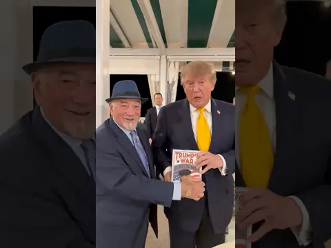 Trump accepts TRUMP'S WAR from the author at Bedminster during a very lengthy dinner discussion