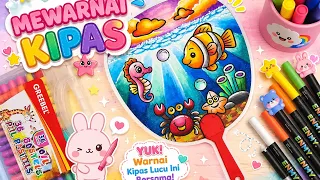 Mewarnai kipas dengan krayon