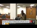 Louisville pastor accused of forging deed appears in court
