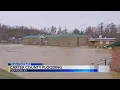 Carter County flooding volunteers pump water out of local school