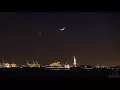 A Time-stack time-lapse of the crescent moon setting over the Statue of Liberty National Monument
