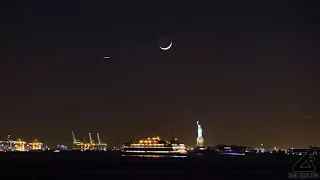 A Time-stack time-lapse of the crescent moon setting over the Statue of Liberty National Monument