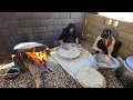 Download Lagu Iranian nomadic life🏕: Baking local bread on fire by nomadic women in nature🌿