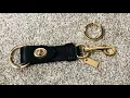 COACH Turnlock Keychain