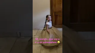 Midiendose su vestido para su quinceanera