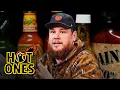 Luke Combs Feels a Heat Hurricane While Eating Spicy Wings Hot Ones
