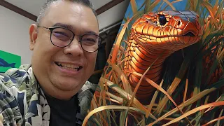 ตบบ่าทักทายคนเจองูเห่ายัดหญ้าขมให้รับประทาน