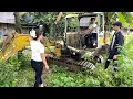 Download Lagu A young girl passed by and helped the farmer fix his broken excavator.