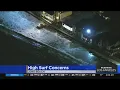 Crews work to block potential flooding in Long Beach amid high tide