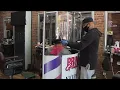 NJ barber creates shields on wheels to keep customers healthy