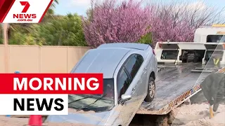 Police chase crash, sinkhole swallows car, tragic rollover crash | 7NEWS