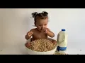 Baby eating Cheerios When Cheerios is life