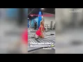Model Tammy Hembrow works out her glutes in pink active wear