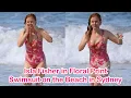 Isla Fisher in Floral Print Swimsuit on the Beach in Sydney