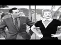 Lucille Ball laughs after she messes up her line