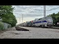 AMTK lead Empire Builder 7 plus Metra outbound at Morton Grove