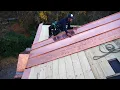 Copper standing seam panel time.