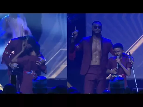 Download MP3 Flavour Brings 12 Year-Old Blind Boy On Stage Performs 'Most High' Together