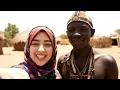 Download Lagu Young muslim tourist lady kisses african tribal man