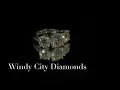 THREE-STONE DIAMOND ENGAGEMENT RING