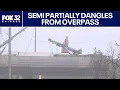 I-290 inbound lanes closed as semi partially dangles from overpass