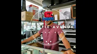 A conversation with a pawnbroker at EZ Pawn Corp s Atlantic Avenue store in New York City