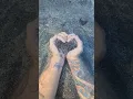 Download Lagu hands in shape of heart with sand flowing #sand #heart #love