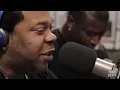 Busta rhymes raps his verse of look at me now live in a studio