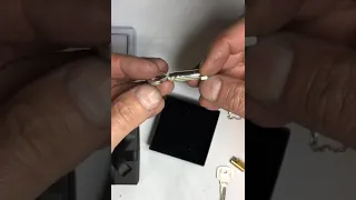 The Secret chastity key with sealed spare In case of Emergency key