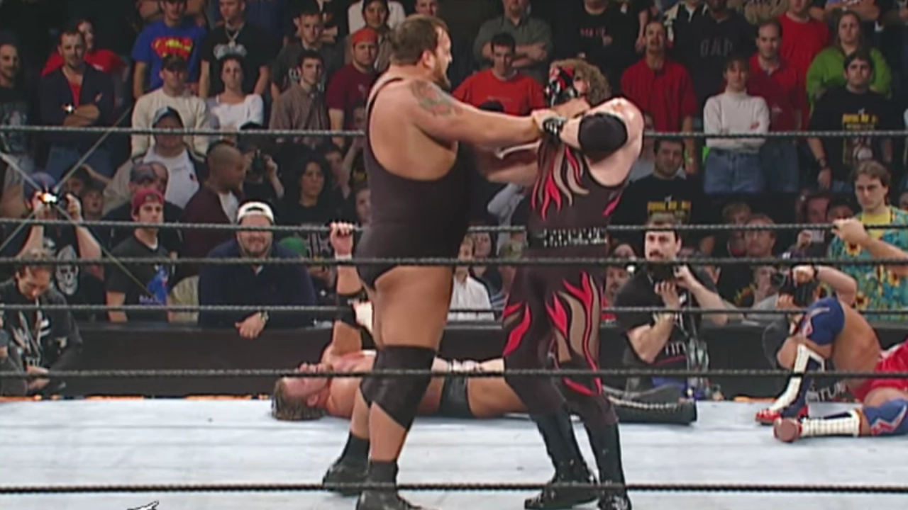 Kane shows off his immense strength by lifting Big Show over-the-top-rope: Royal Rumble 2002