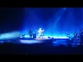 Mitski playing an a invisible guitar