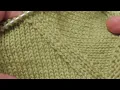 Raglan decrease where decreases lean away from the middle stitch