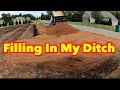 Leveling my Yard Filling the Ditch In With Dirt - Ventrac 4500