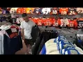 Sports apparel store near Empower Field ready for new season but curious about future