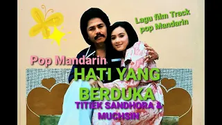 Download TITIEK SANDHORA \u0026 MUCHSIN A. - Hati Yang Berduka (1981) - Karya:  A. Riyanto MP3