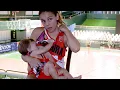 Argentine basketball player breastfeeding baby during game