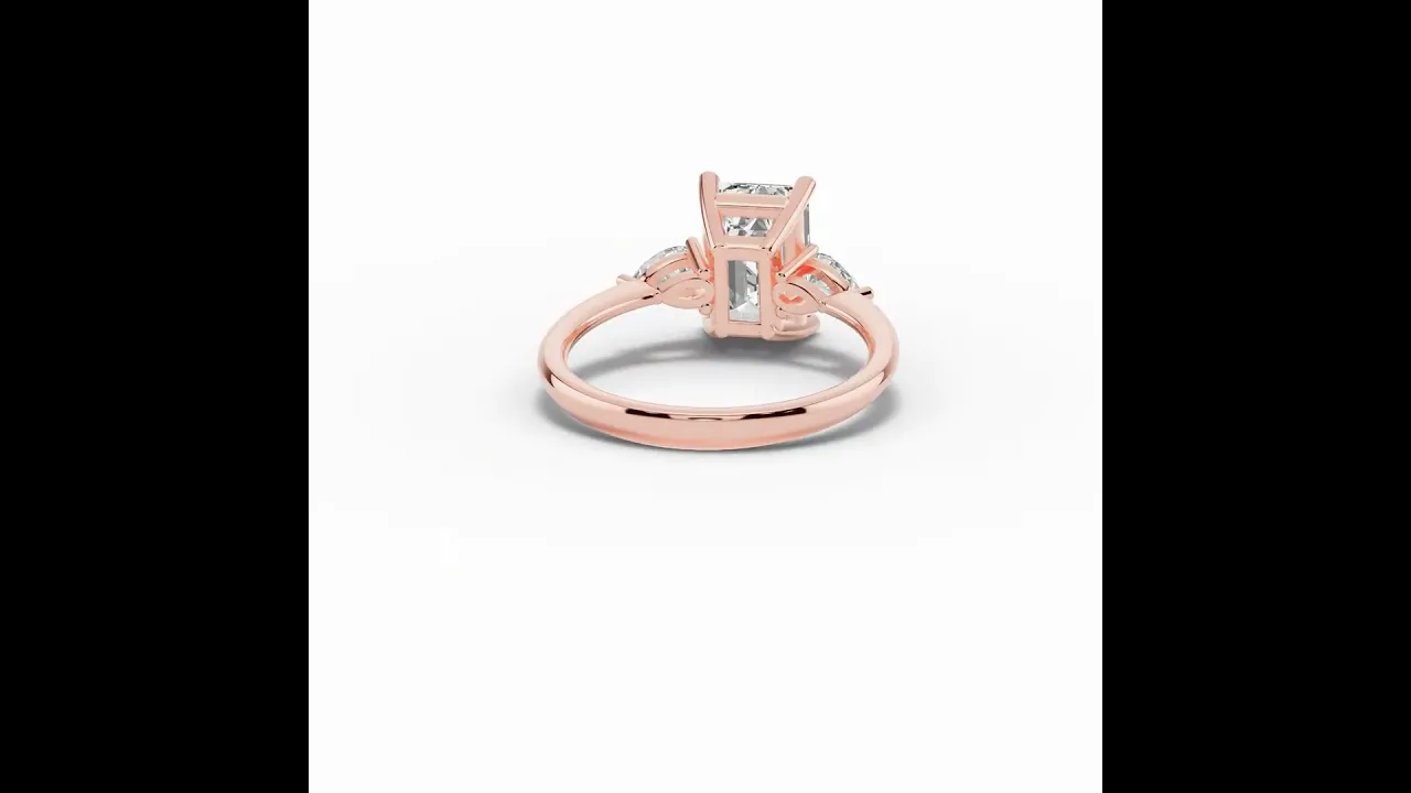 Vionne Emerald Cut Three-Stone Engagement Ring