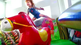 Adley finds Spirit the horse Giant play slide and jumping on toys a fun best day ever with Dad