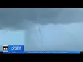 Waterspout touches down in Hollywood Beach
