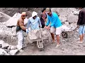 Download Lagu Loading Temple Stones Into Trucks in Crowd..