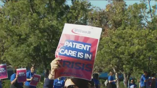 Kaiser employees striking outside La Mesa facility