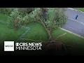 Cottage Grove homeowners clear away mess after storm