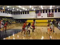 Derrick Harrell hits a three from the top of the key