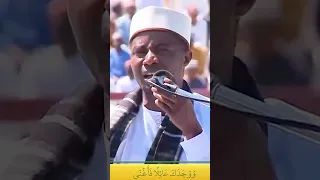 القارئ الافريقي قرآ سورة الضحى بنفس واحد و باسلوب جدیدة عیدی شعبان 