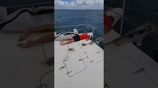 Luke lazing on the job! #catamaran #sailingboat