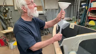 Reinforced fillet on aft side of forward bulkhead. Also preparing for injecting epoxy.