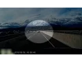 Dashcam shows police officer swerving across road