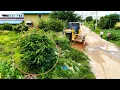 Lagu Amazing bulldozer clearing dirt and trash filling land with dump trucks