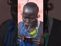 Download Lagu Woman from Surma tribe inserts lip plate | Omo Valley Ethiopia #shorts